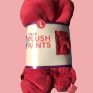 Soft velvety pink pajama bottoms. New in package